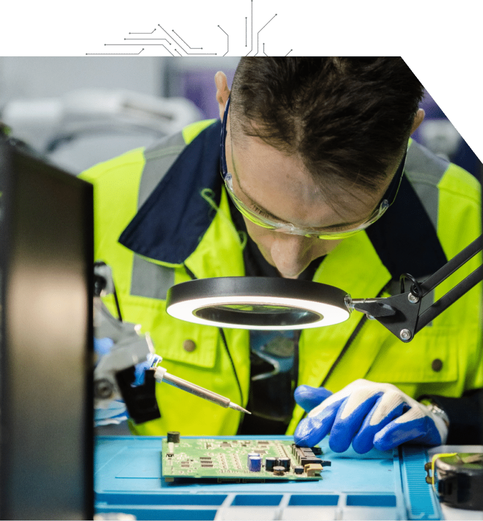 Lab Technician Inspecting a Circuit Board